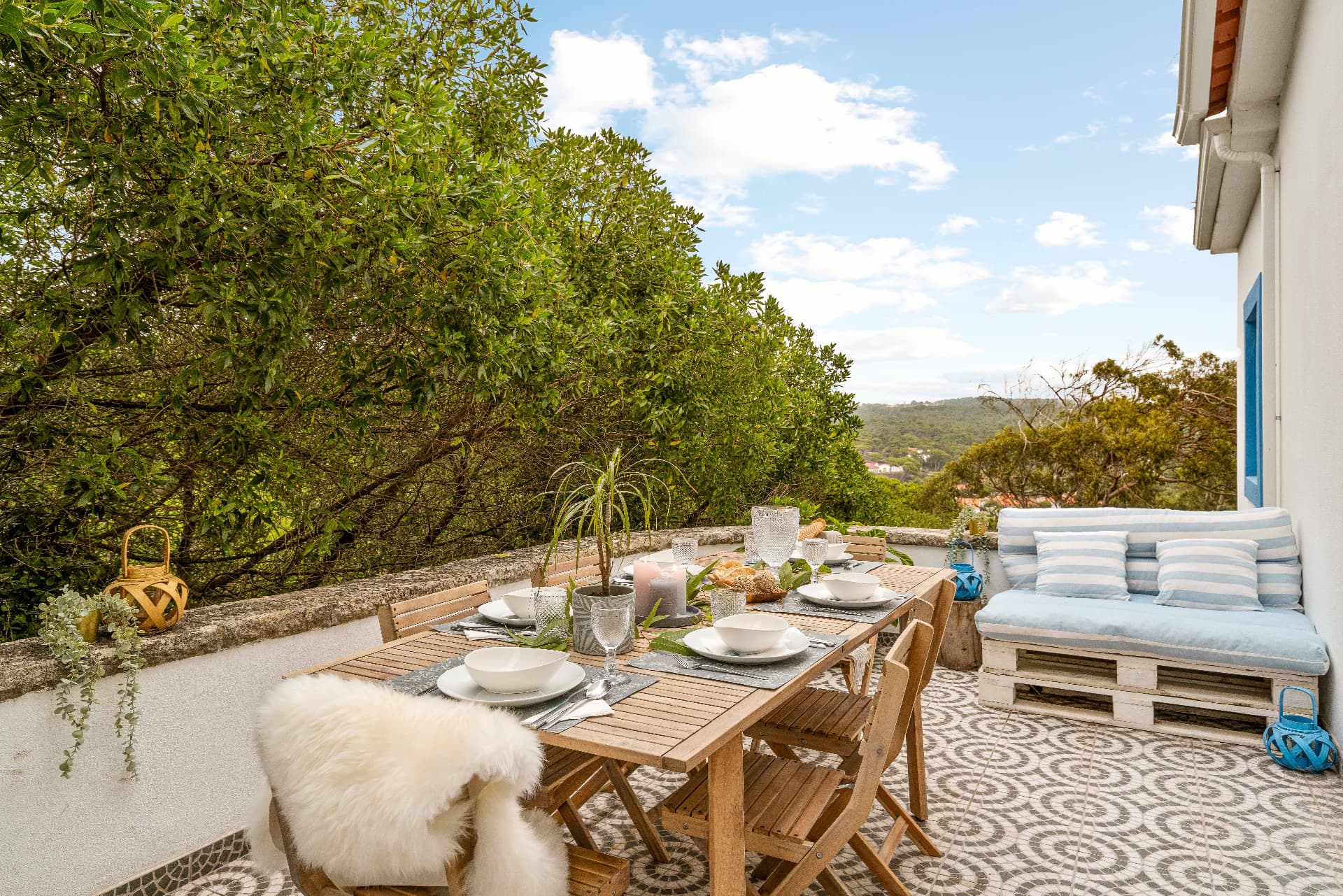Outdoor dining terrace surrounded by greenery at Retreat Oasis Portugal