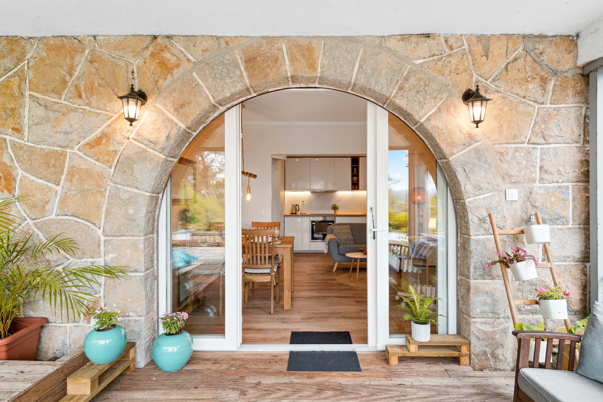 Stone archway opening into a Retreat Oasis house