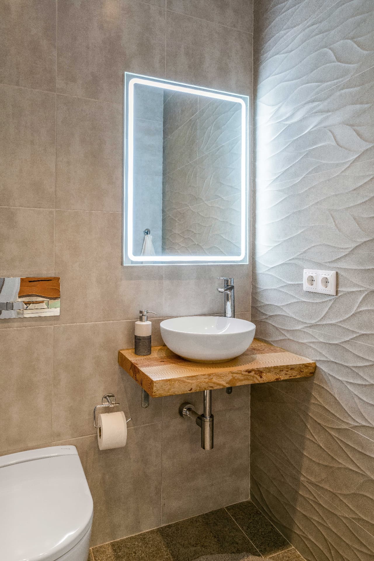 Bathroom with a wooden vanity and illuminated mirror at Retreat Oasis Portugal
