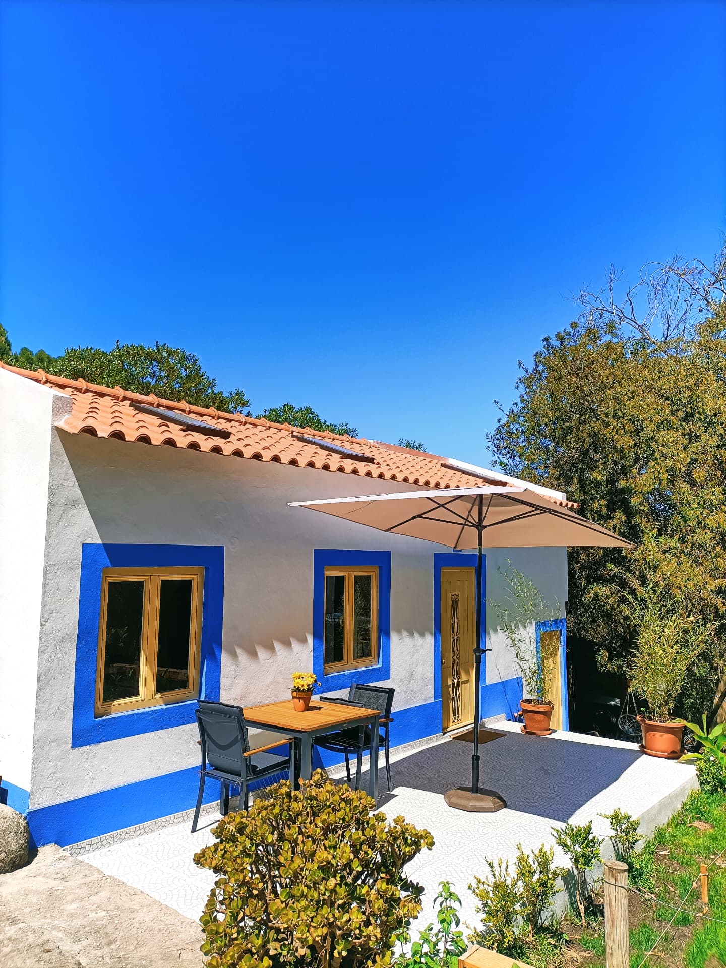 Casa do Sol terrace with a shaded outdoor table
